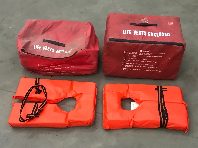 lot 63 image: (2) Marine Life Vest Sets