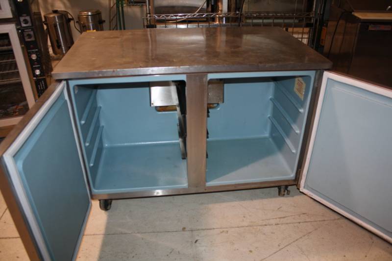 Delfield, Mod #UC4048, 2 door under counter refrigerator, NSF , caster mounted, 115 volts, 5 amps, 48x28x32.5H-1Runs Cools