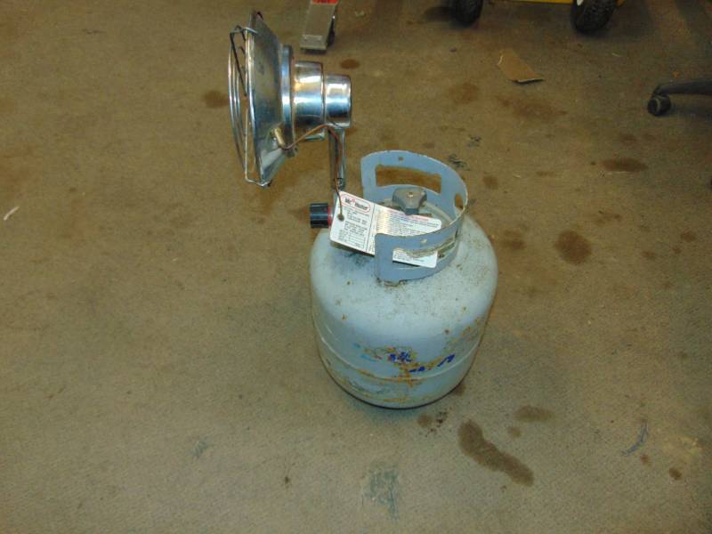 lot 80 image: Mr Heater Sunflower Style Heater and LP Tank