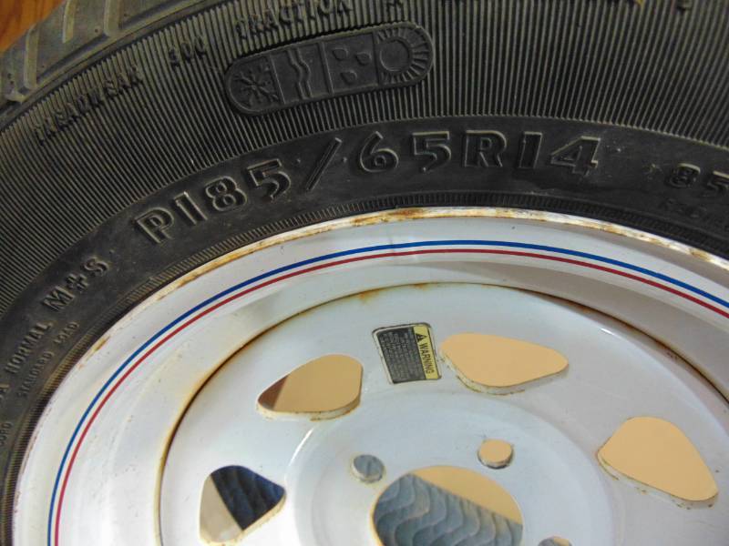 lot 98 image: Good Year P18565R14 Trailer Tire and Rim