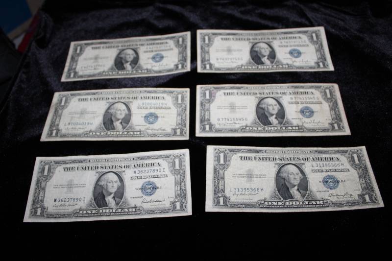 lot 206 image: Lot of (6) 1935  One Dollar Silver Certificate Bills