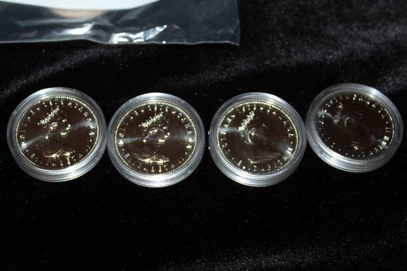 lot 236 image: Lot of (4) Canadian Mint sue Proof Coins In Poly Prestation Cases