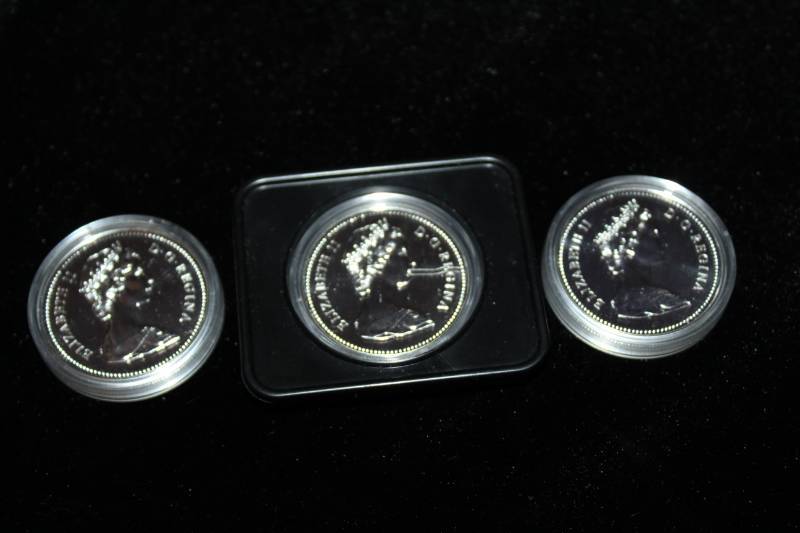 lot 237 image: Lot of (3) Canadian Mint sue Proof Coins In Poly Prestation Cases