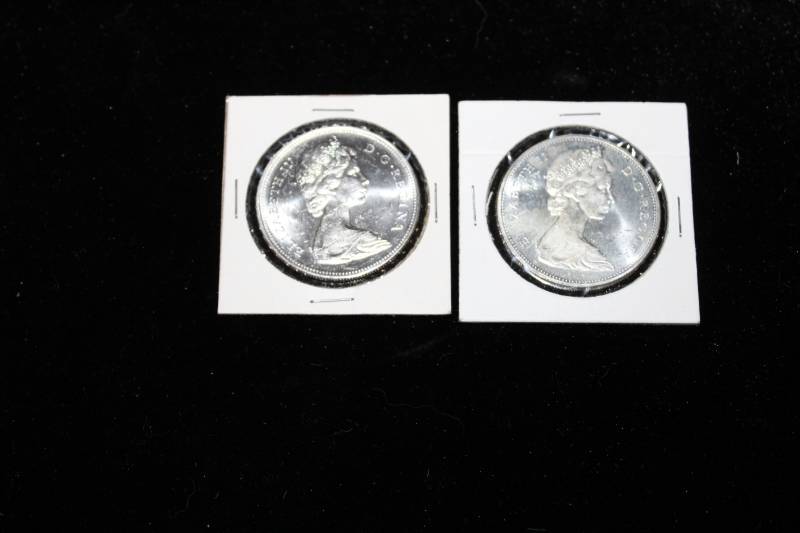 lot 217 image: Lot of (2) 196x Canadian Silver Dollars