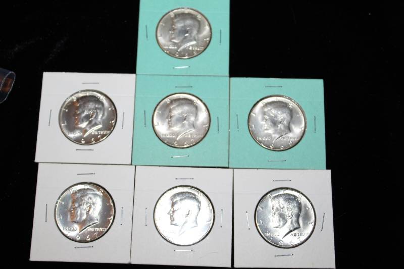 lot 285 image: Lot of (7) 1965 - 1969 Kennedy Half Dollars