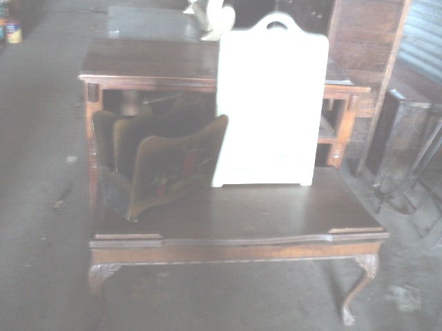 coffee table - needs work, magazine...