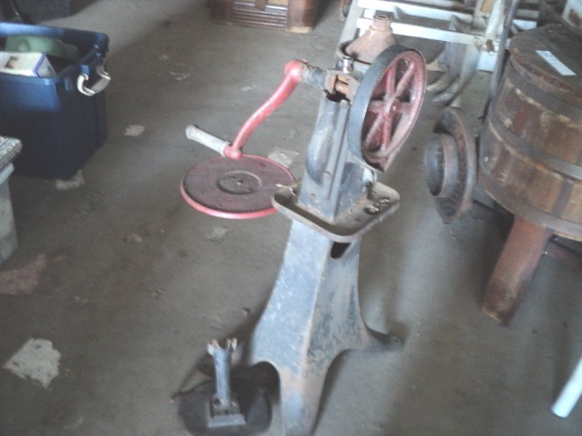 vintage cast iron piece of equipmen...