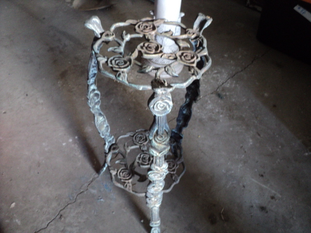 cast iron plant stand...
