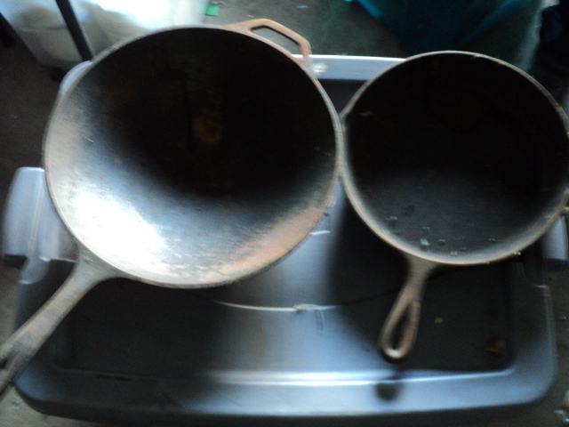 2 cast iron cookware - on is a Lodg...