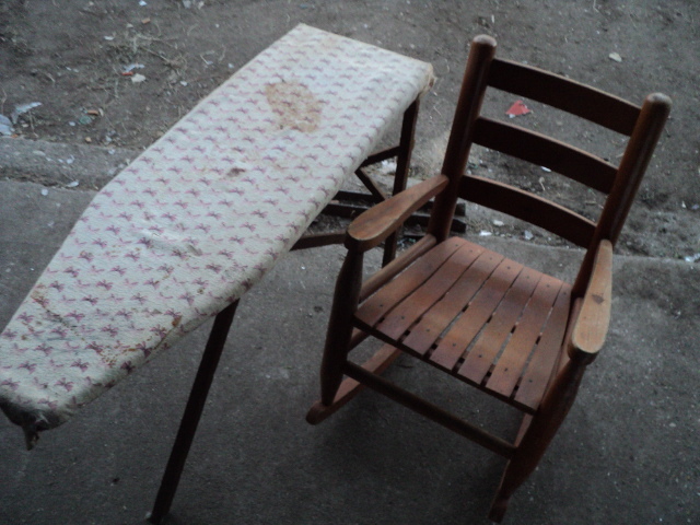 childs rocker and toy ironing board...