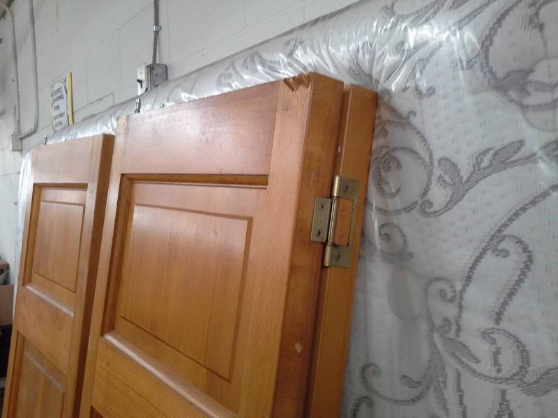 Pair of Wooden Bi-Fold Closet Doors
