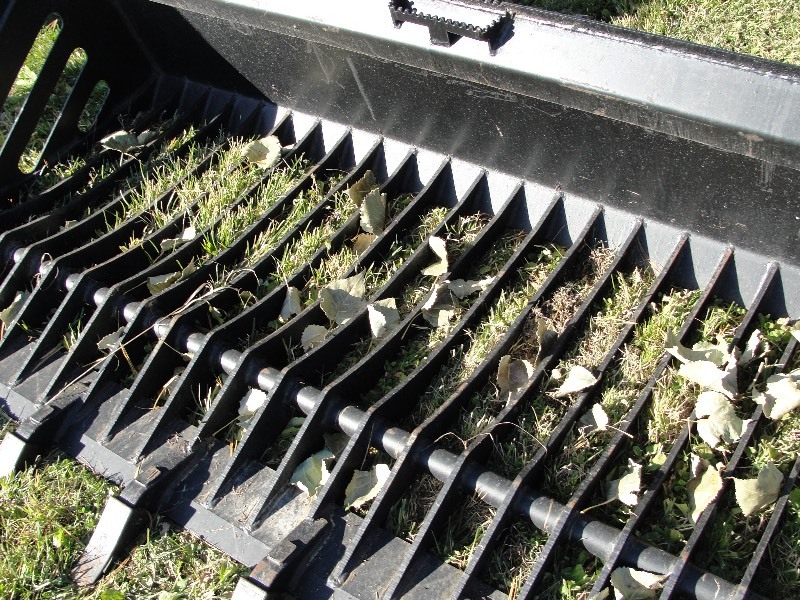 UNUSED 80 ROCK LANDSCAPING BUCKET