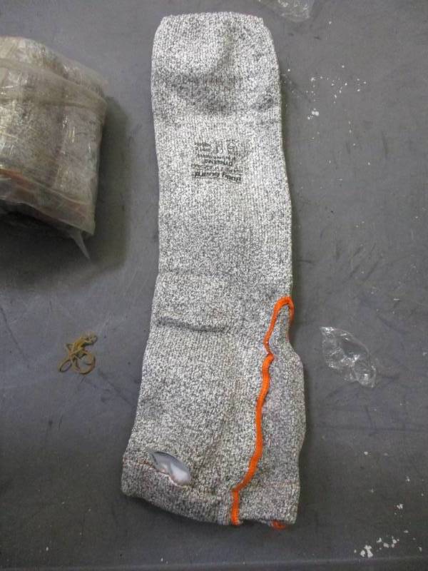 lot 22 image: 18 Salt & Pepper 7ga Dyneema Cut Level 2 Body Guard Sleeve