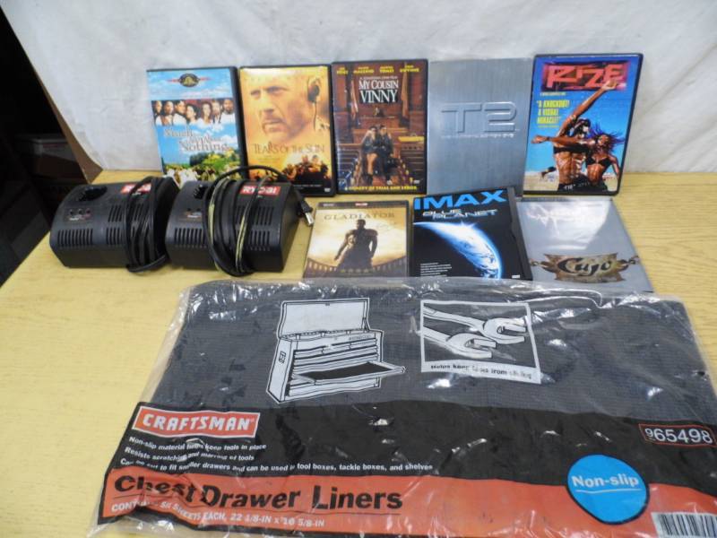 lot 85 image: DVDs - Ryobi Chargers - Drawer Liners