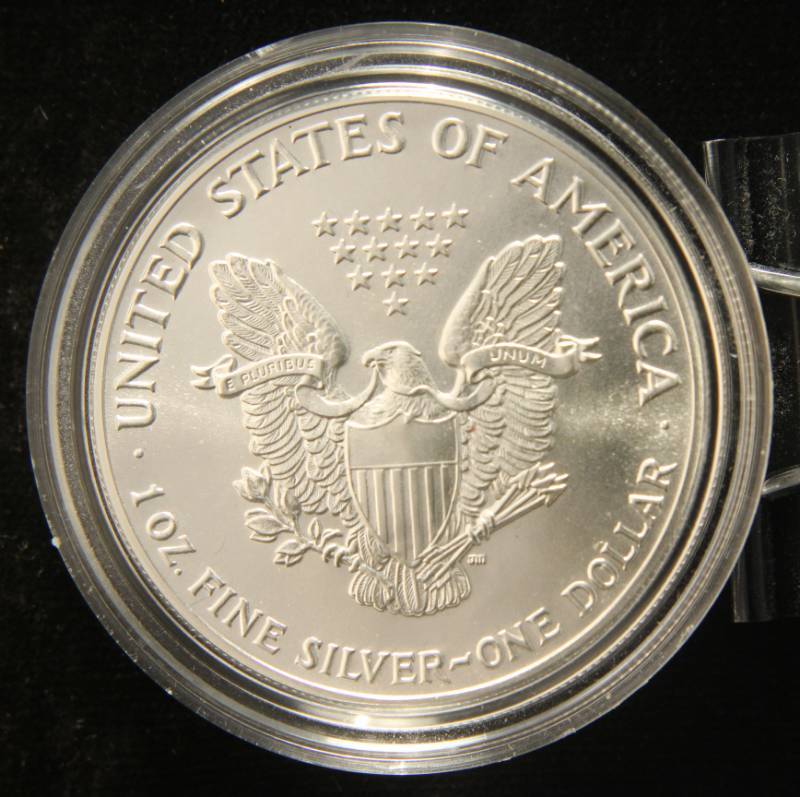 1986 AMERICAN SILVER EAGLE 1 TROY OZ. .999 FINE SILVER IN AIRTITE
