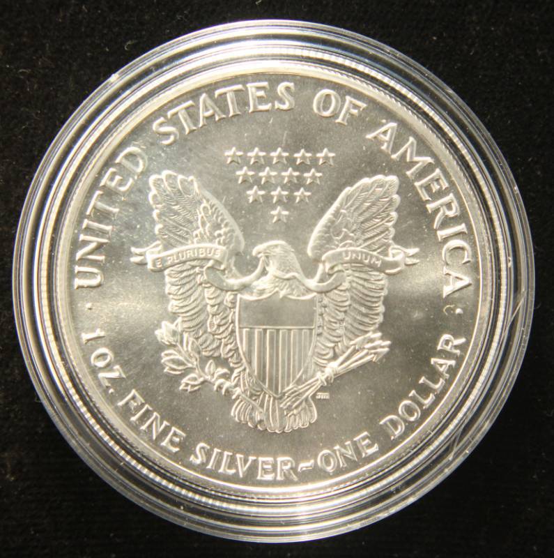 1990 AMERICAN SILVER EAGLE 1 TROY OZ. .999 FINE SILVER IN AIRTITE HOLDER