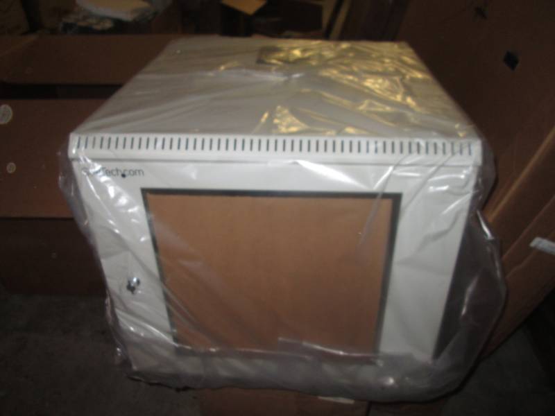 white cabinet with clear window and...