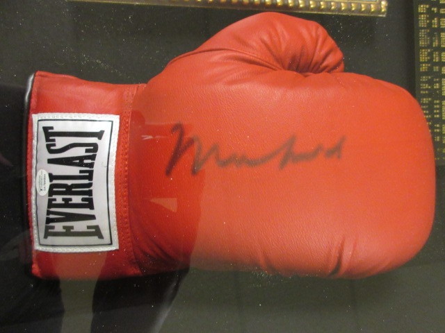 lot 701 image: MUHAMMAD ALI SIGNED BOXING GLOVE COLLAGE