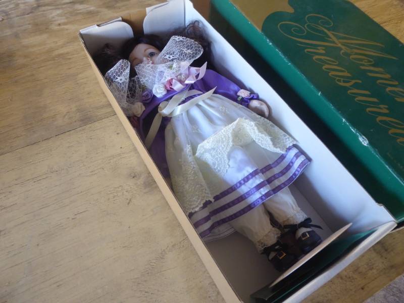lot 75 image: Moments Treasure Genuine Porcelain Doll