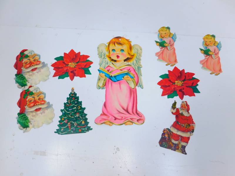 lot 56 image: Nine Vintage Cardboard Christmas Decorations To Be Hung Up