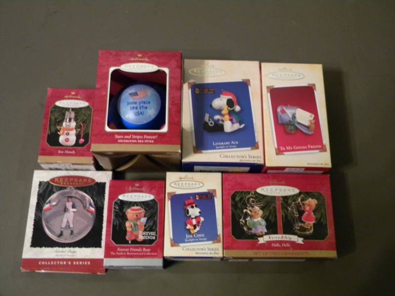 lot 23 image: 8 Hallmark Keepsake Ornaments