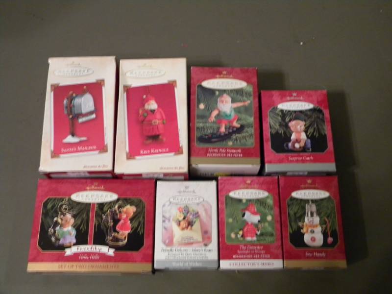 lot 24 image: 8 Hallmark Keepsake Ornaments