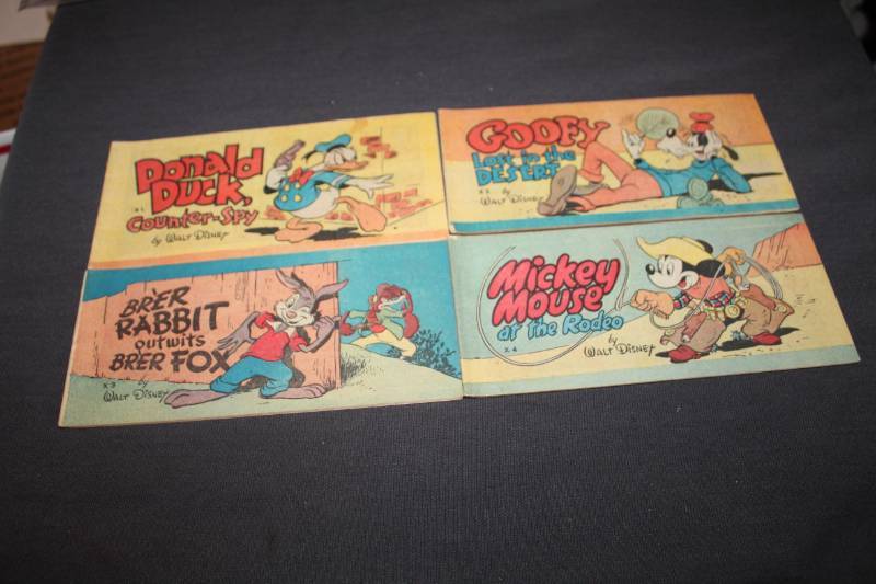 lot 53 image: Walt Disney Comic Books - Donald Duck Counter Spy, Brer Rabbit Outwits Brer Fox, Goofy Lost In The Desert, Mickey Mouse At The Rodeo