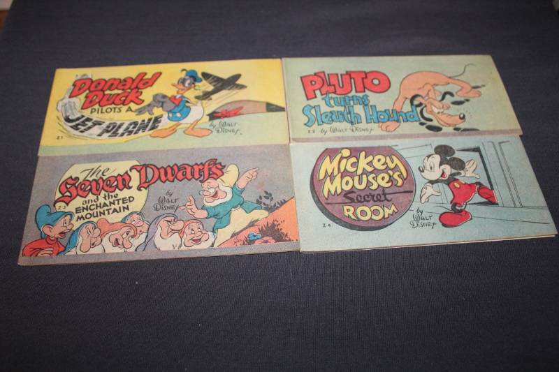 lot 55 image: Walt Disney Comic Books - Donald Duck Pilots A Jet Plane, The Seven Dwarfs and the Enchanted Mountain, Pluto Turns Slueth Hound, Mickey Mouses Secret Room