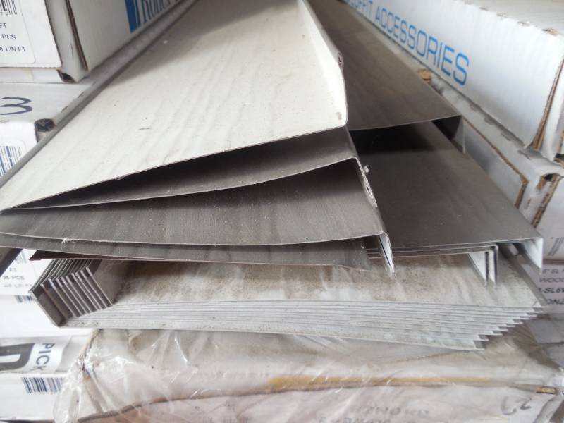 (1) BOX OF 25 ROLLEX 8 WOOD GRAIN FASCIA IN BRONZE  EACH PIECE IS 12