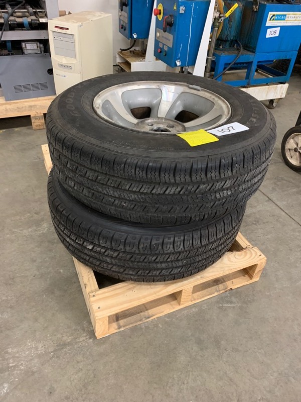 lot 107 image: 2 truck tires with wheels