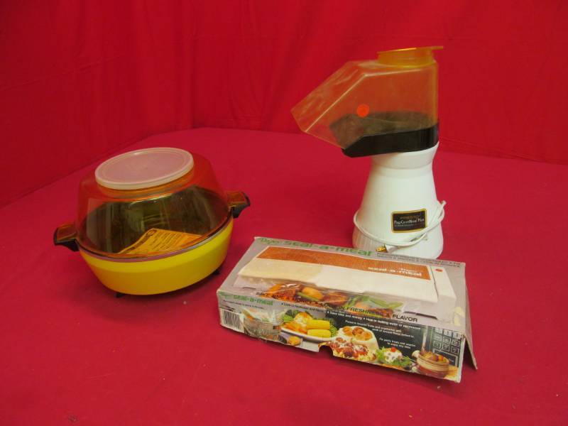lot 7 image: Daisy seal meal, Presto corn popper, sears popcorn popper