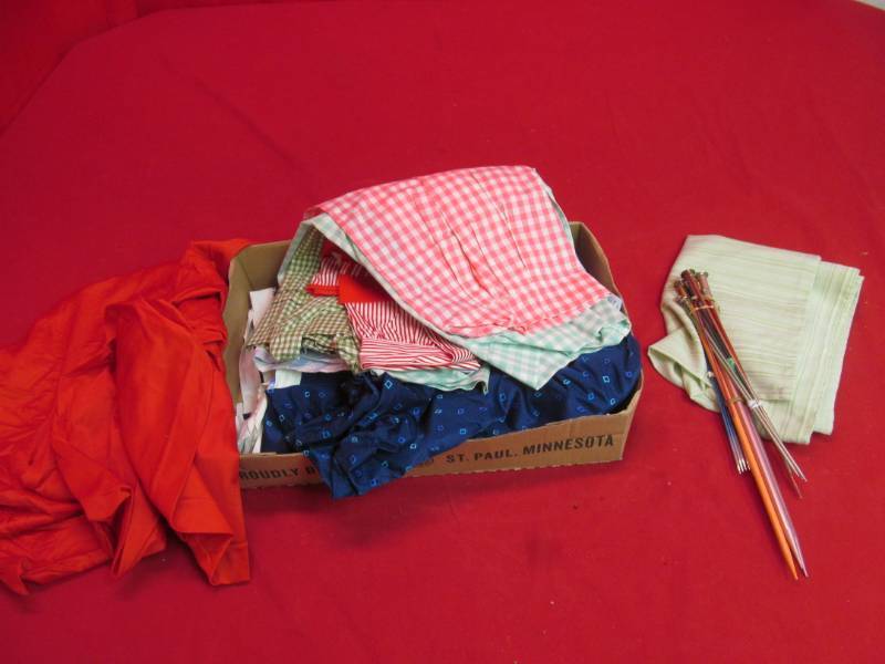 lot 11 image: vintage aprons, material, knitting needles