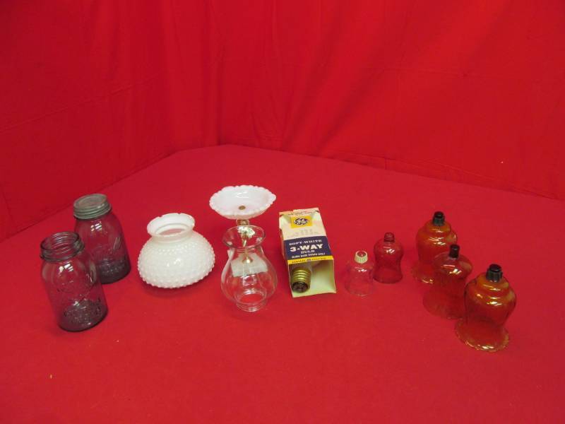 lot 55 image: blue Ball jars, light bulb, glass globe