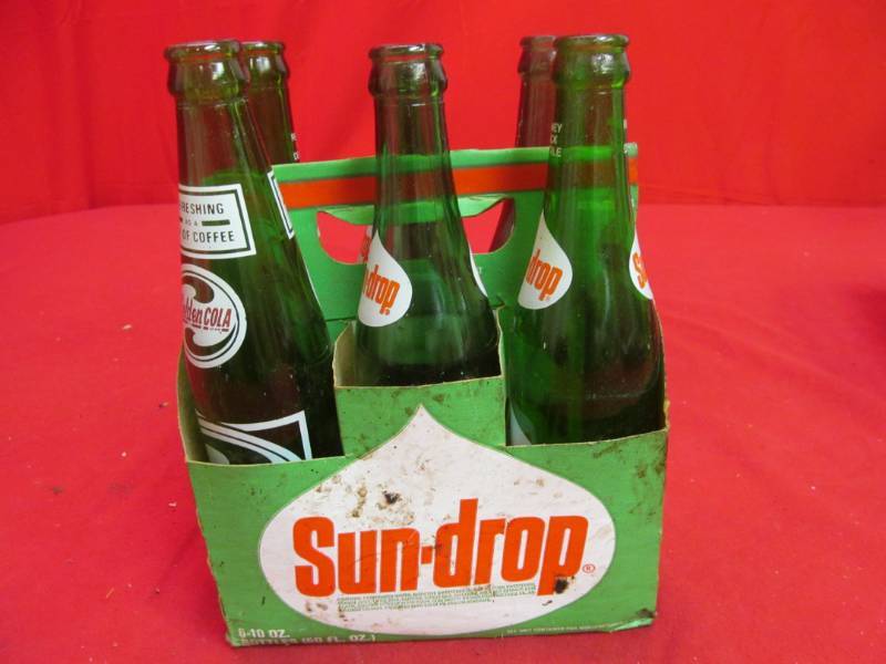 lot 122 image: sun drop pop bottles