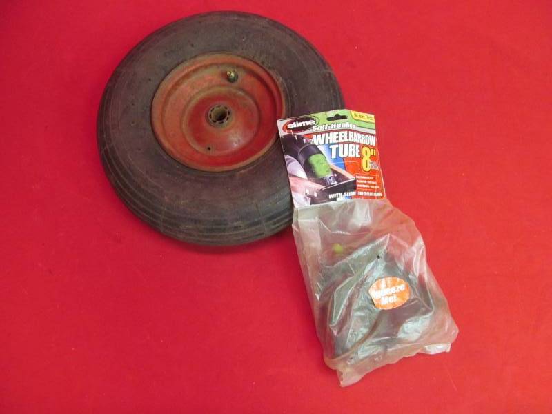 lot 135 image: wheel barrow tube, wheel barrow tire