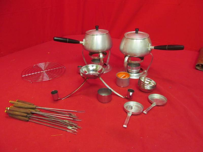 lot 212 image: fondue sets