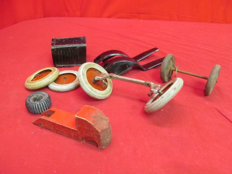 lot 81 image: White USA hood ,fenders, metal rubber tires, steel wheels, Buddy & tire wood fire truck block