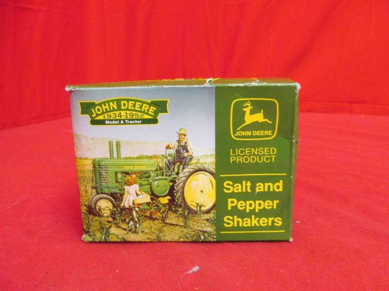 lot 82 image: john Deere salt and pepper shakers, new