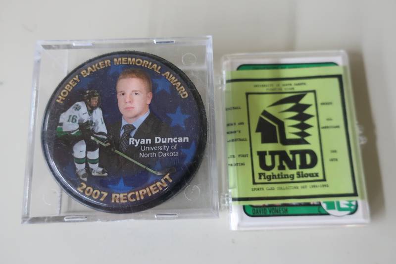 lot 519 image: UND Sioux Puck & Card Lot