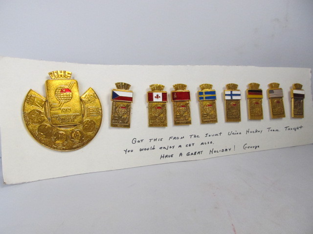 lot 60 image: Vintage Russian National Hockey Team Pin & Medal Set