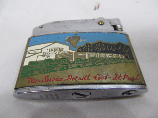 lot 108 image: Nice Vintage Seattle Rendering Works Advertising Lighter