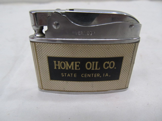 lot 112 image: Vintage HOME OIL CO Advertising Lighter