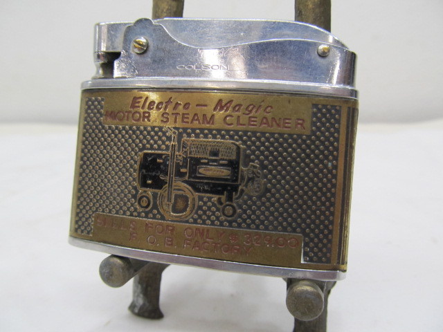 lot 114 image: Vintage ELECTRO-MATIC Steam Cleaner Advertising Lighter
