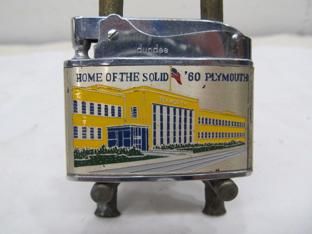 lot 115 image: NICE Vintage 1960 Plymouth Car Advertising Lighter