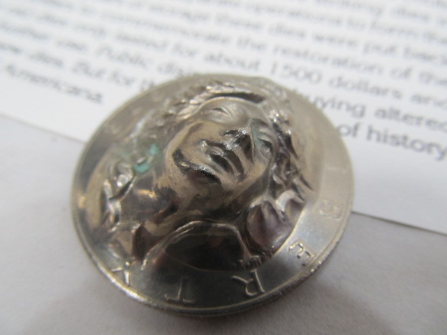 lot 173 image: Statue of Liberty Pressed-Out Dollar Coin