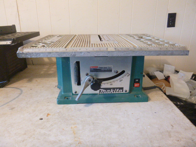 lot 12 image: Makita Table Saw