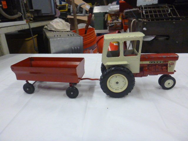 lot 111 image: Vintage Ertl Toys Farmall Tractor and Trailer