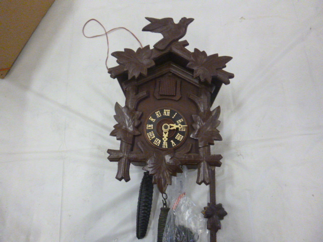 lot 135 image: Black Forest Birds and Leave Cuckoo Clock