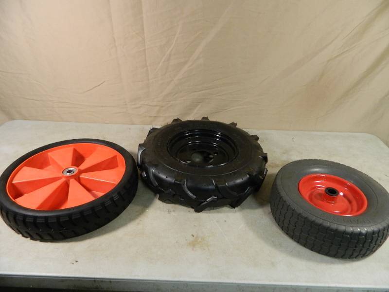 lot 38 image: 3 New Flat Free Utility Tires