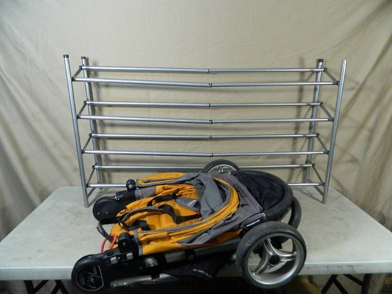 lot 140 image: Expensive Stroller and Expandable Show Rack